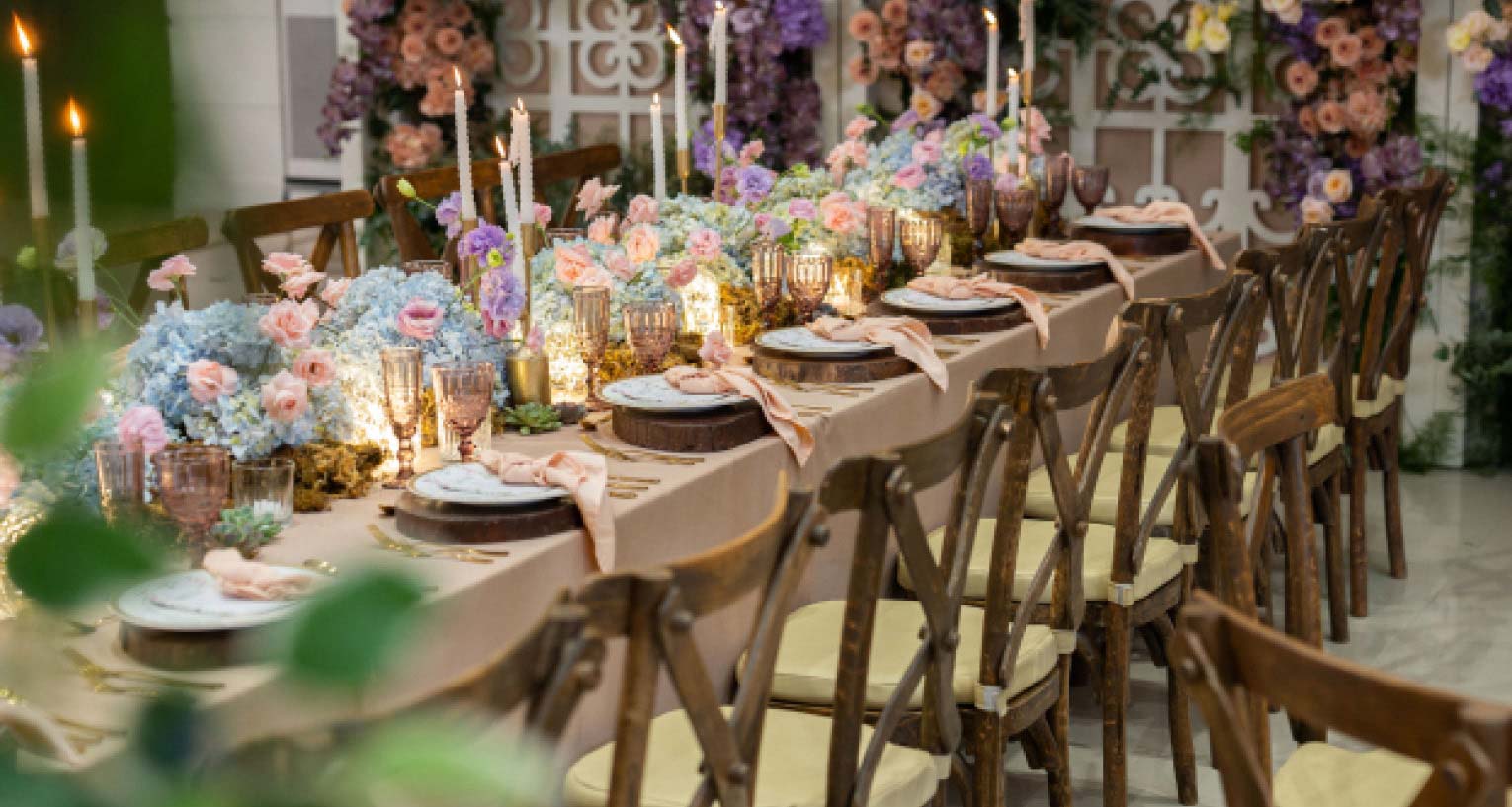 Rustic themed styling, wooden dining set with candles and flowers