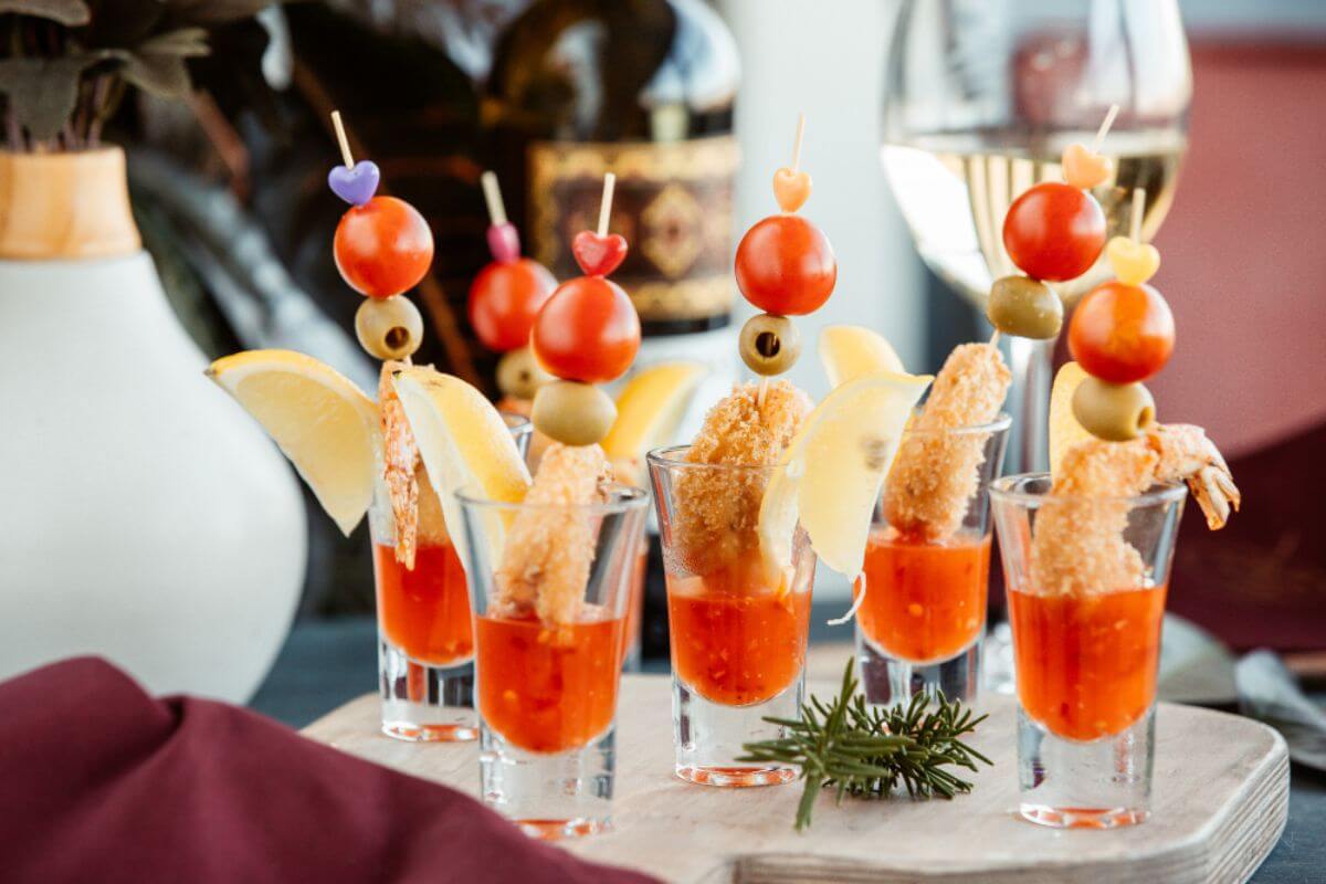 Elegant appetizer shots served at a wedding reception or corporate catering event.